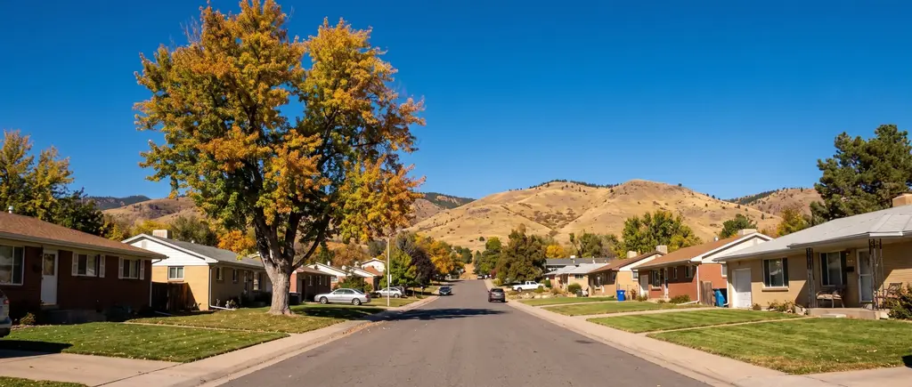 A Lakewood street rising toward Green Mountain in autumn
